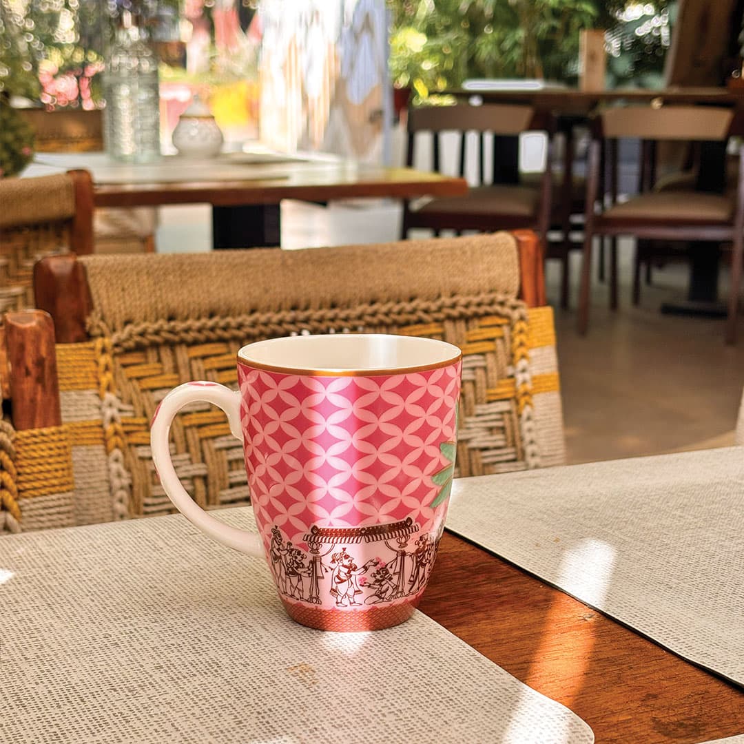 Indian artisan crafting gold-plated tableware